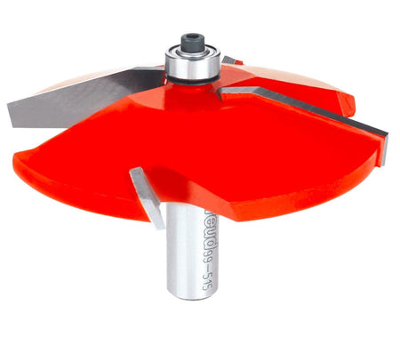 A high-resolution product shot of the Freud 99-515 3-1/2 inch Quadra-Cut raised panel router bit, featuring red carbide-tipped cutters and a 1/2 inch silver shank for professional woodworking applications.