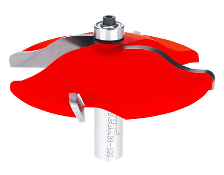 A high-resolution product shot of the Freud 99-520 3-1/2 inch Quadra-Cut raised panel router bit, featuring red carbide-tipped cutters and a 1/2 inch silver shank for professional woodworking.