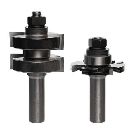 Image of tongue and groove bit set. The image shows two silver router bits with multiple cutting edges and black components near the top. The bit on the left appears to have adjustable parts with wing-like extensions.