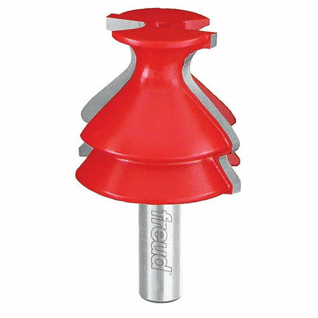 A studio photo of the Freud 99-480 base and cap molding router bit, showing its red Perma-SHIELD coating and 1/2-inch shank.