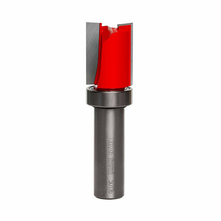 A detailed product view of the Freud flush trim router bit (50-116) with a $1/2$ inch shank, top bearing, and red Perma-SHIELD coating on the carbide cutters.