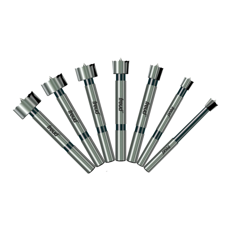 A professional product illustration of the seven carbide Forstner bits included in the Freud PB-107B set, displayed in a fan arrangement to show the progression of sizes from 1/4 inch to 1 inch.