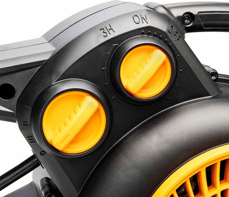 Close-up of the GEARWRENCH air mover’s control panel showing two yellow dials. One dial adjusts operational modes including OFF, ON, and 3-hour timer; the other controls fan speed or duration.