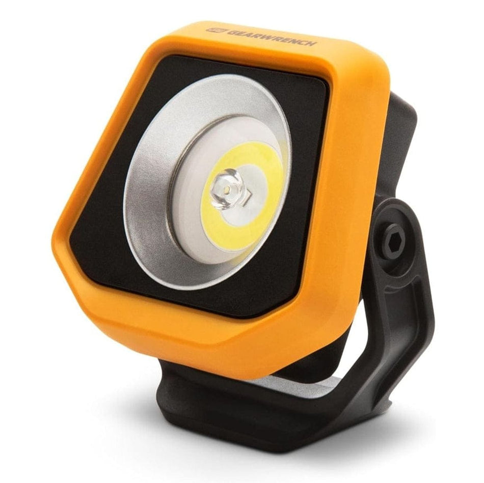 A three-quarter studio shot of the GEARWRENCH 1000 lumen shop light, model GWSL1000, showing its yellow and black body, COB LED, and pivoting base.