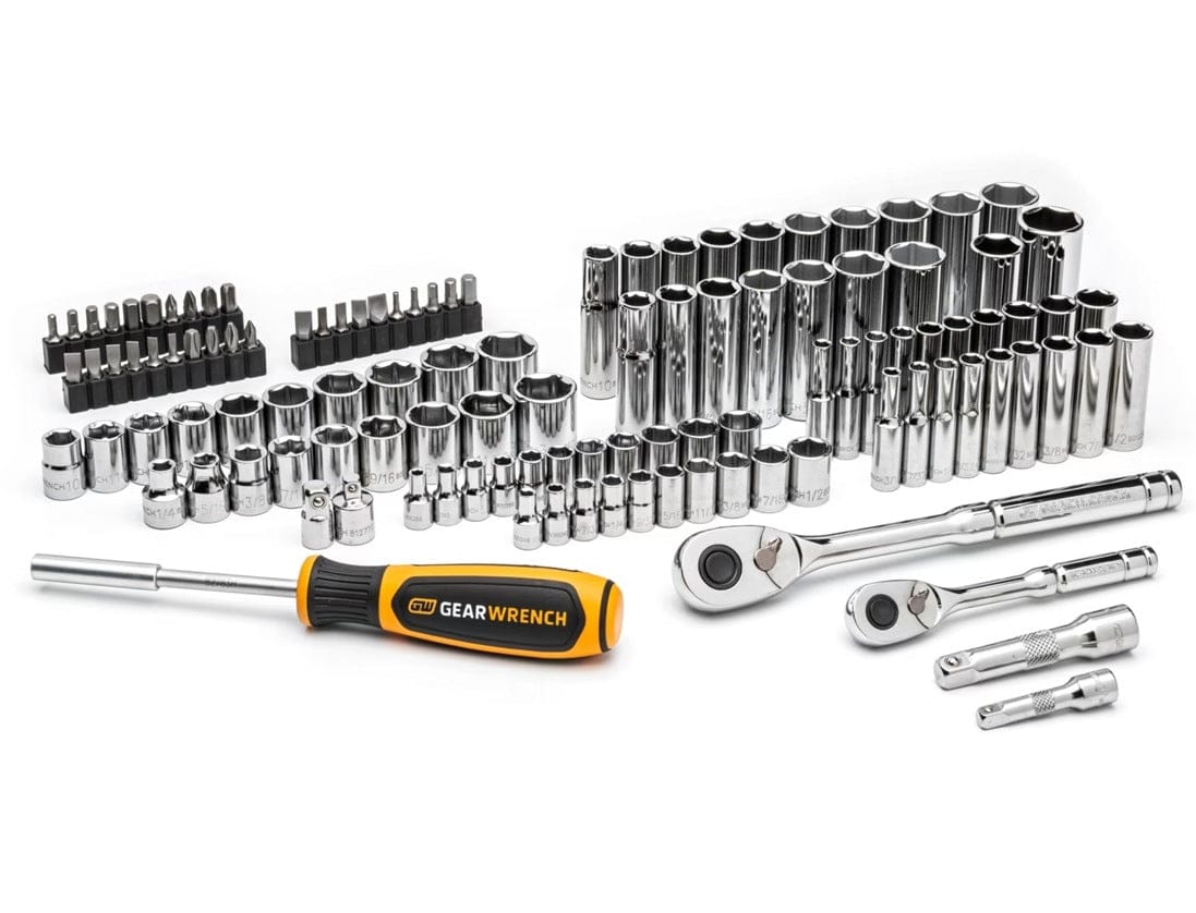 The primary components of the 115-piece tool set laid out on a white background, including sockets, ratchets, extensions, screwdriver handle, and bit sets.