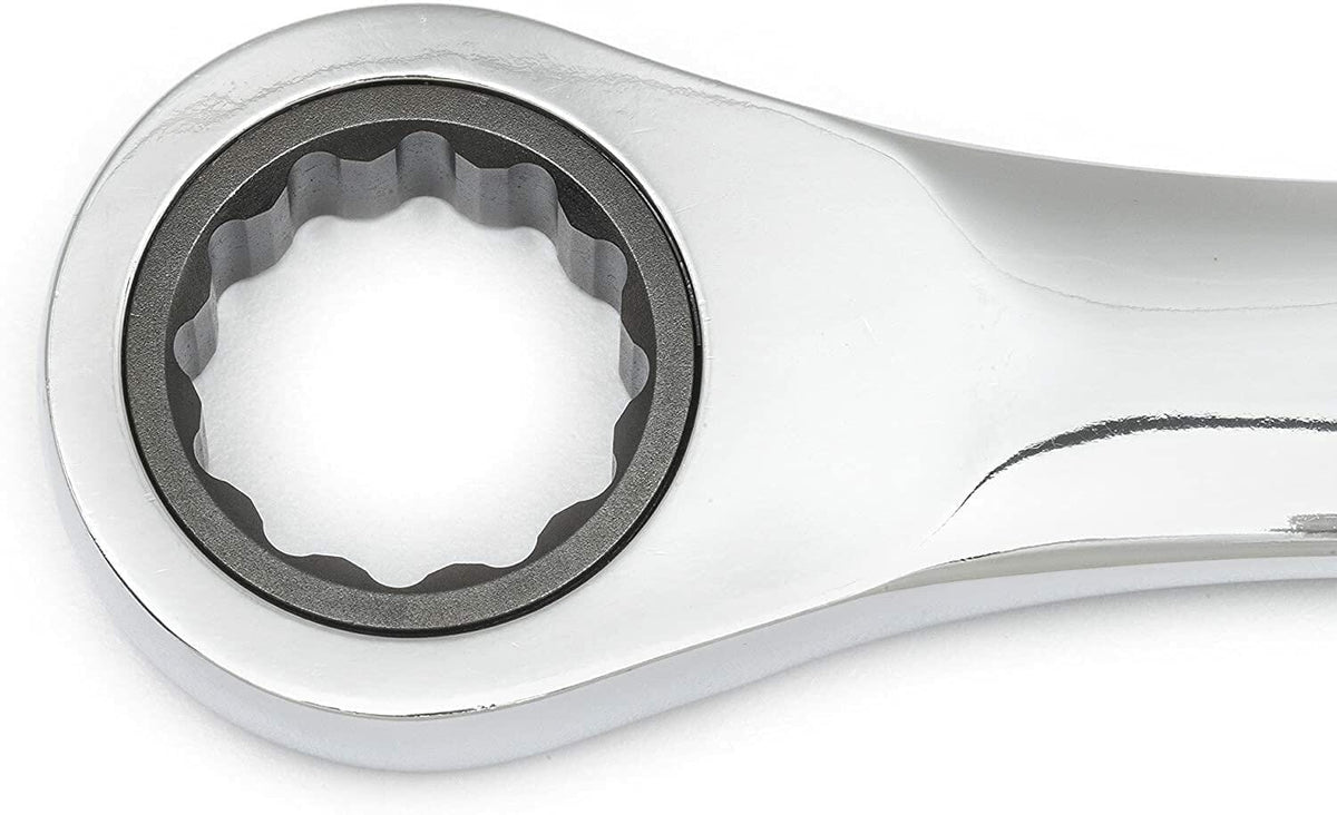 Ratcheting box-end wrench with polished chrome finish and toothed inner ring. Designed for continuous turning in one direction without removing the tool, ideal for confined mechanical spaces