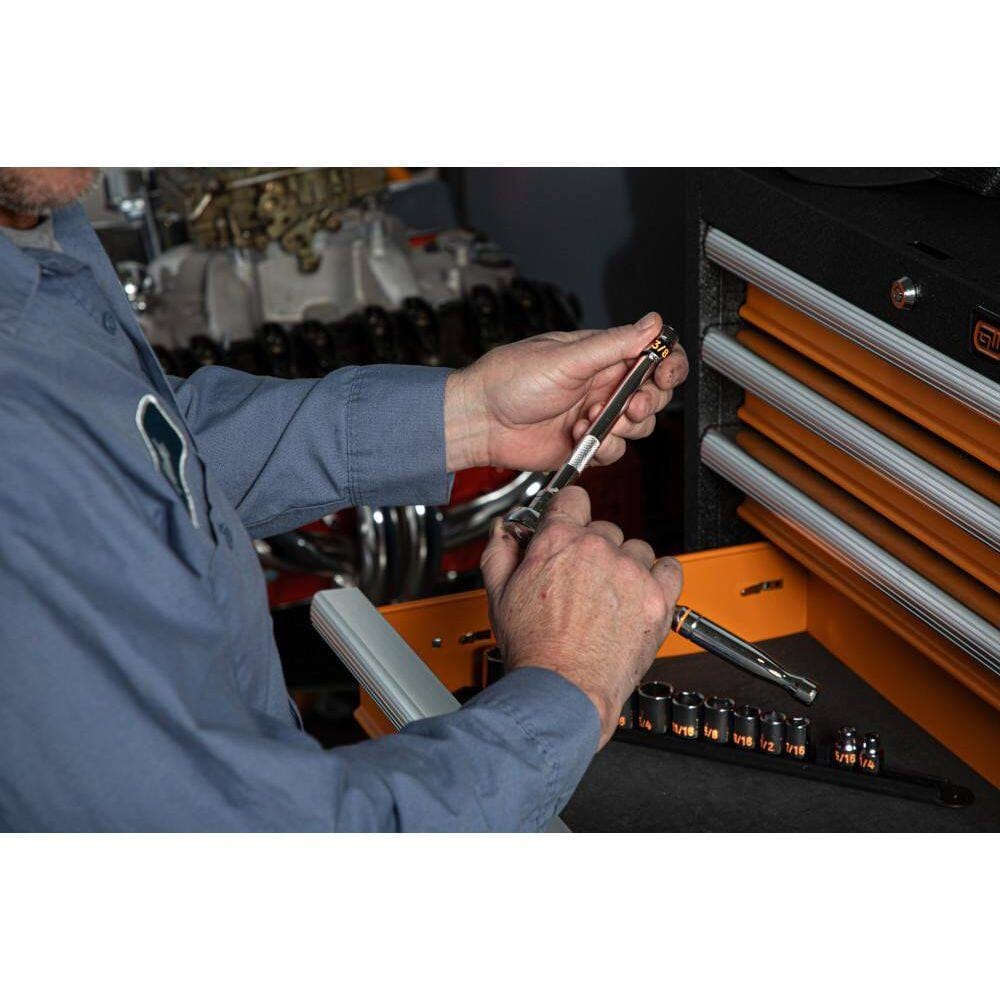 An action photo of a technician selecting a socket from the GEARWRENCH Hi-Viz set in a tool drawer, demonstrating how the large color-filled markings facilitate rapid tool identification.