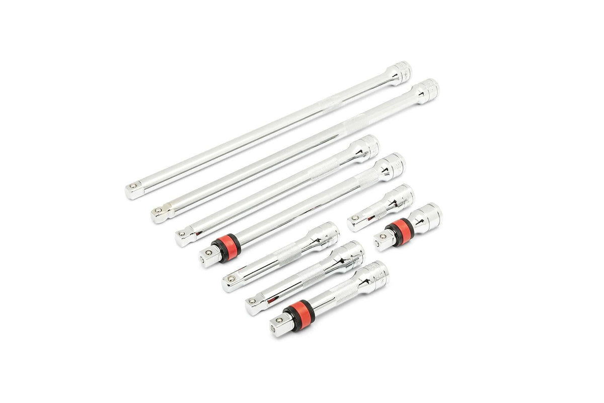 Eight chrome extension bars and universal joints with swivel mechanisms. Some pieces include red and black rings for grip or locking. Designed for socket wrench access in hard-to-reach mechanical zones.