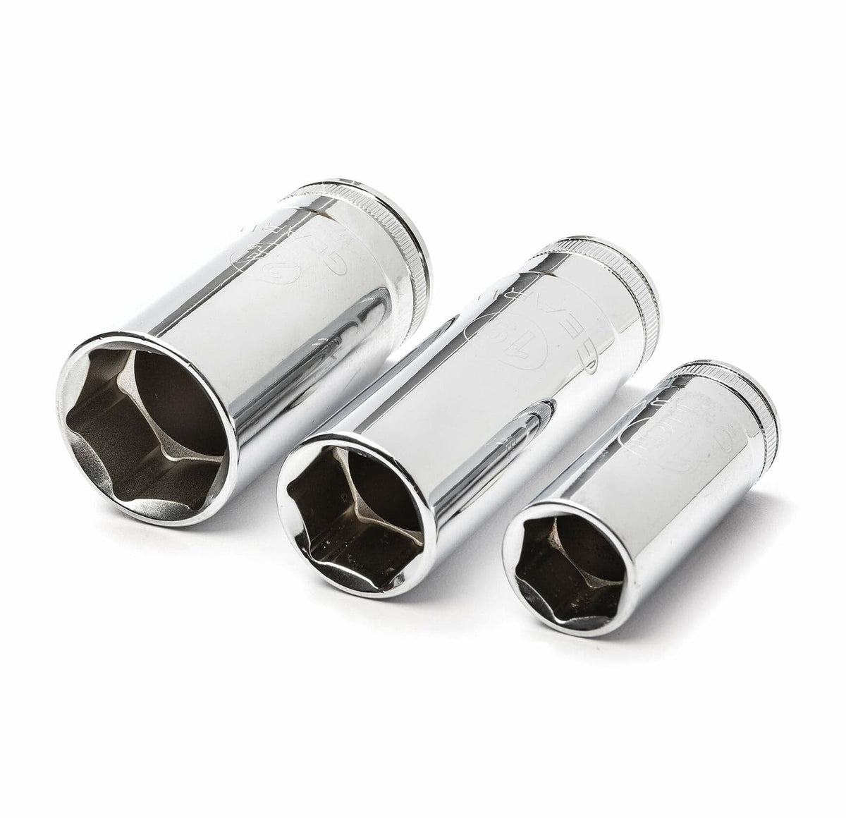 Set of three metallic socket extensions on a white background