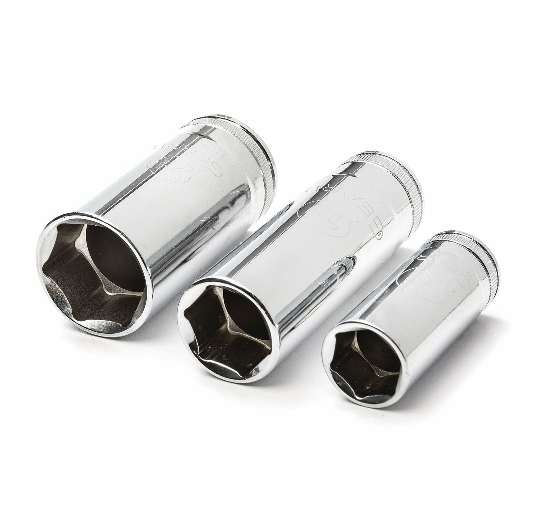 Set of three metallic socket extensions on a white background