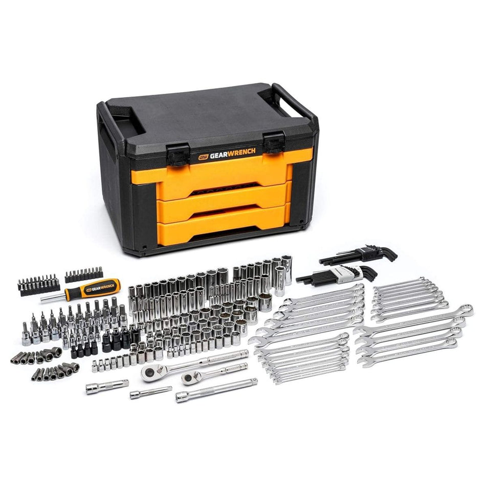 An overview studio shot of a massive GEARWRENCH professional mechanics tool set featuring 6-point sockets, ratcheting combination wrenches, hex keys, a bit driver, and extensions neatly laid out in front of its heavy-duty 3-drawer black and orange storage chest.