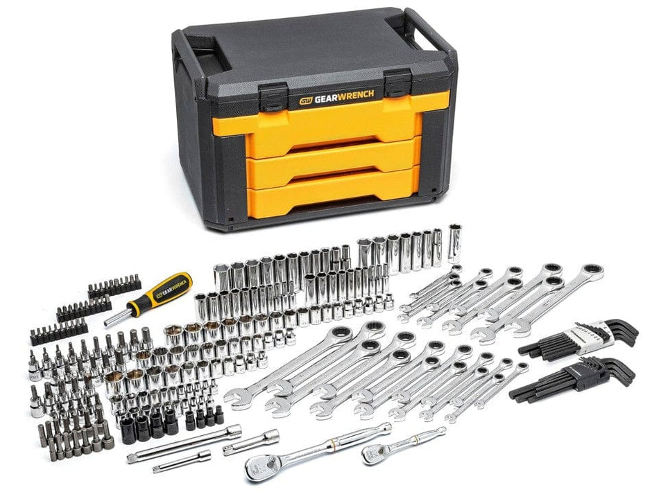 The complete GEARWRENCH 219-piece mechanics tool set (80940) laid out in front of the closed 3-drawer black and orange storage box.