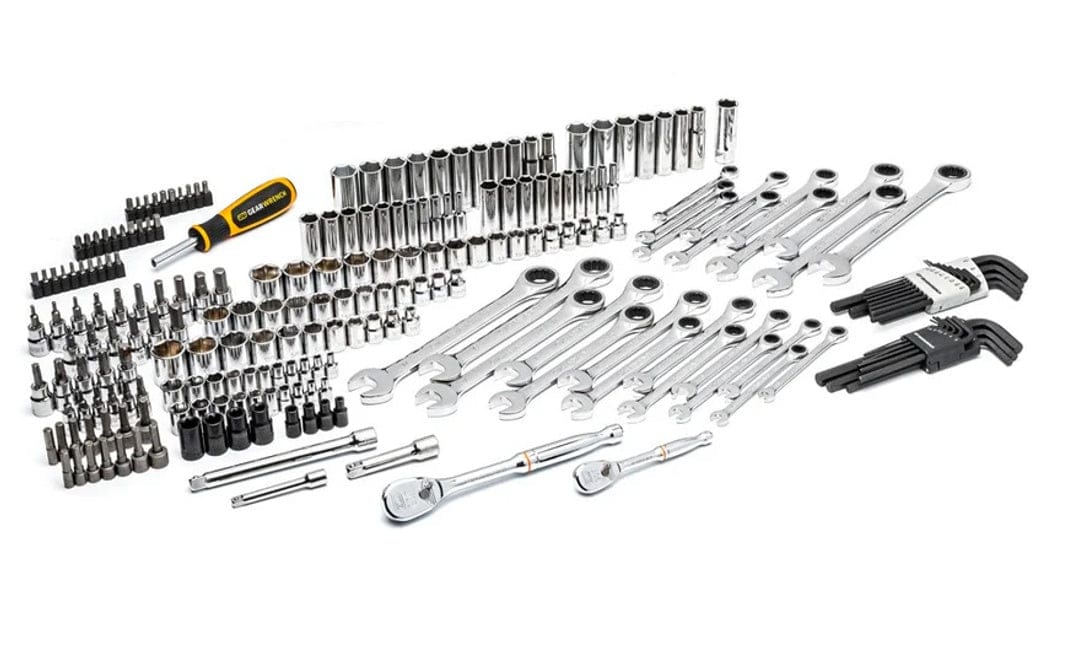 The complete contents of the 232-piece GEARWRENCH mechanics tool set laid out on a white background, including sockets, ratcheting wrenches, ratchets, hex keys, and bit drivers.