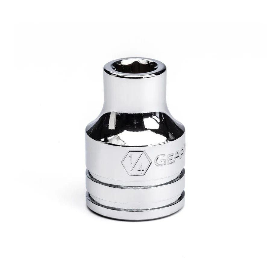 A close-up studio shot of a small chrome 1/4-inch drive socket, highlighting the polished finish and drive size etching.