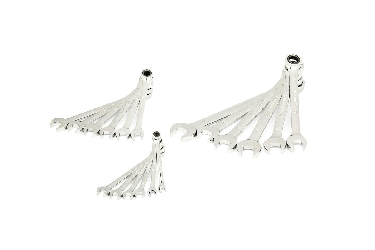 Three sets of polished combination wrenches are arranged in fan patterns by size. Each wrench features an open-end and a box-end, suitable for tightening or loosening fasteners in mechanical work.