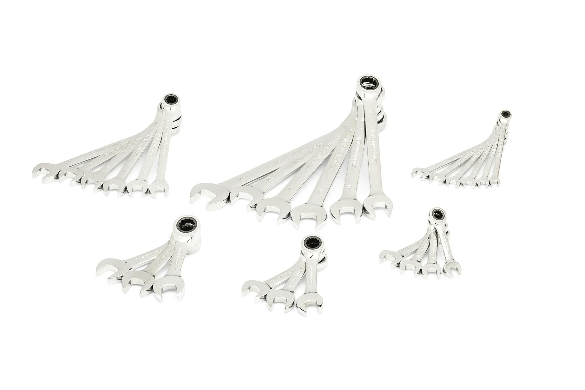 Multiple groups of polished ratcheting combination wrenches are arranged in fan-like layouts. Each wrench has an open-end and a ratcheting box-end, organized by size for mechanical or automotive use.