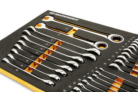 A black foam tray with orange accents holds GEARWRENCH combination wrenches sized from 6mm to 24mm. Each wrench has an open-end and a ratcheting box-end, organized for modular tool chest storage.