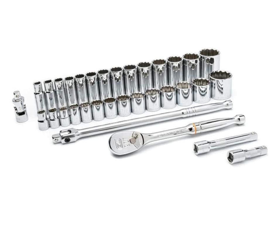 A comprehensive 33-piece GEARWRENCH 1/2 inch drive SAE mechanics tool set featuring a 90-tooth teardrop ratchet, breaker bar, standard and deep 12-point sockets, extension bars, and a universal joint in a professional full-polish chrome finish.