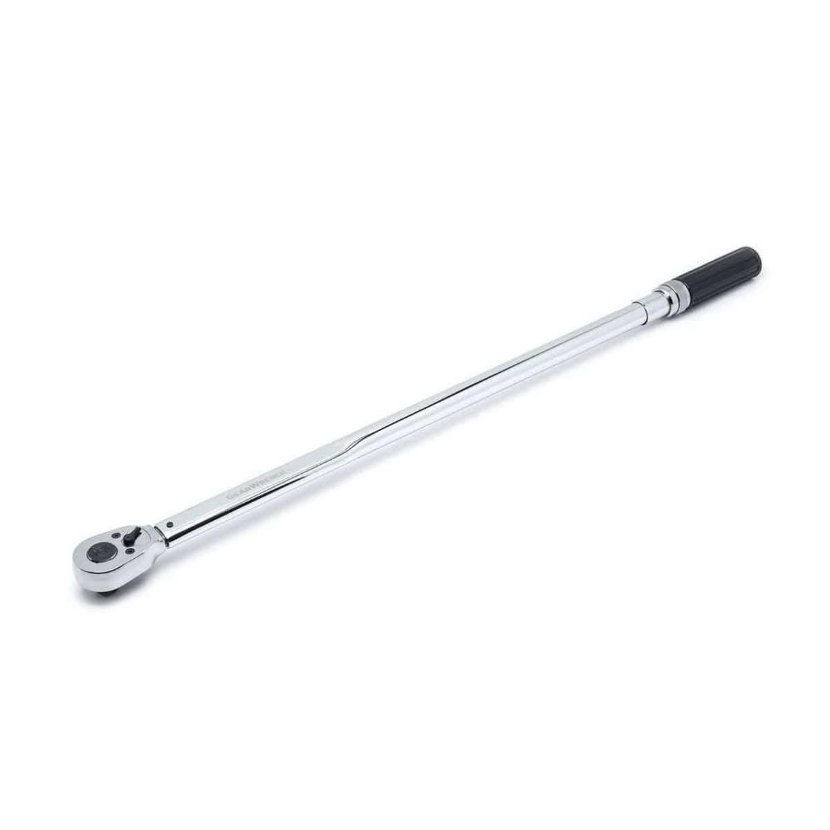 Close-up of a GEARWRENCH micrometer torque wrench with a long polished handle, black grip, and ratcheting head. Designed for applying precise torque to fasteners in automotive and industrial settings. Features a square drive and torque scale.
