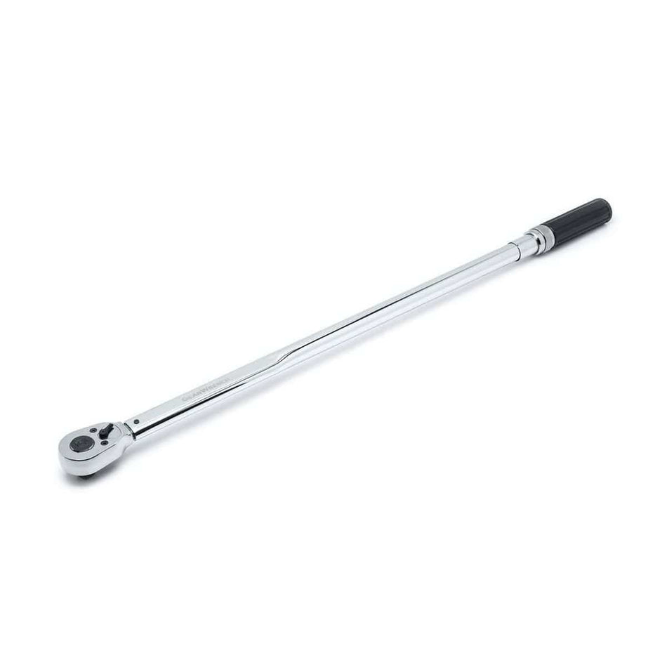 Close-up of a GEARWRENCH micrometer torque wrench with a long polished handle, black grip, and ratcheting head. Designed for applying precise torque to fasteners in automotive and industrial settings. Features a square drive and torque scale.