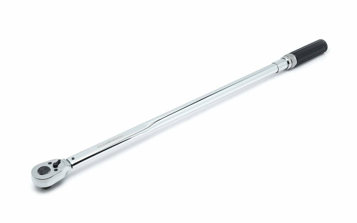 Close-up of a GEARWRENCH micrometer torque wrench with a long polished handle, black grip, and ratcheting head. Designed for applying precise torque to fasteners in automotive and industrial settings. Features a square drive and torque scale.