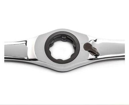 Close-up of the ratcheting mechanism on the GearWrench T-handle tool, showing the high-torque internal gear and the thumb-operated reversing lever designed for one-handed operation.