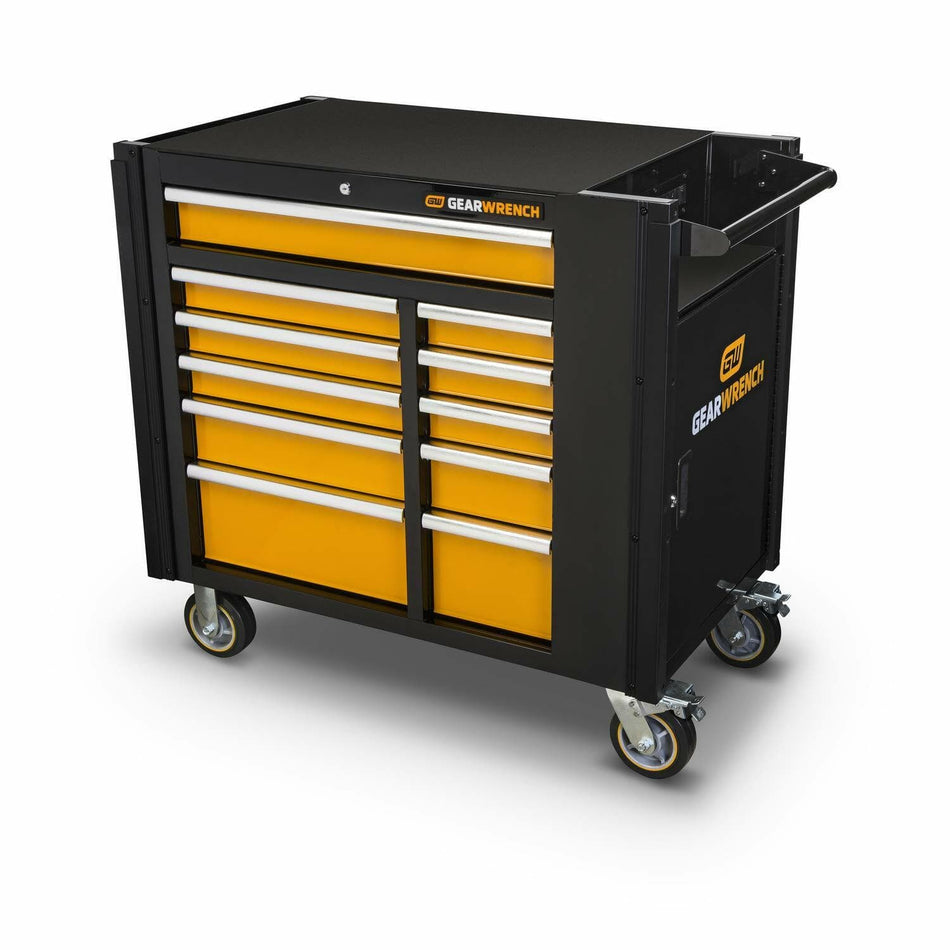 A three-quarter view of the black and orange GEARWRENCH 11-drawer mobile work station, showing the side handle and the heavy-duty caster wheels.