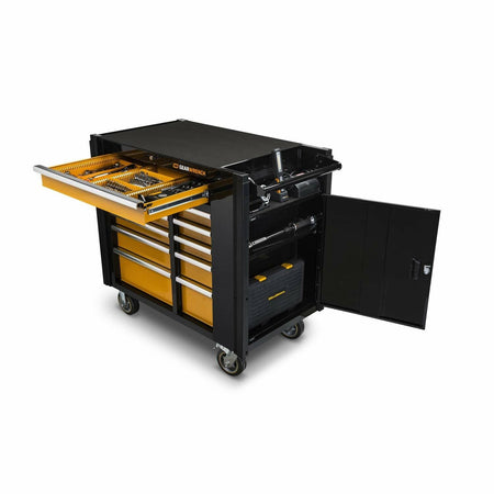 An overhead angle view of the GEARWRENCH mobile work station with the top work surface exposed, the top drawer pulled out showing organized tools, and the secure side storage locker opened.