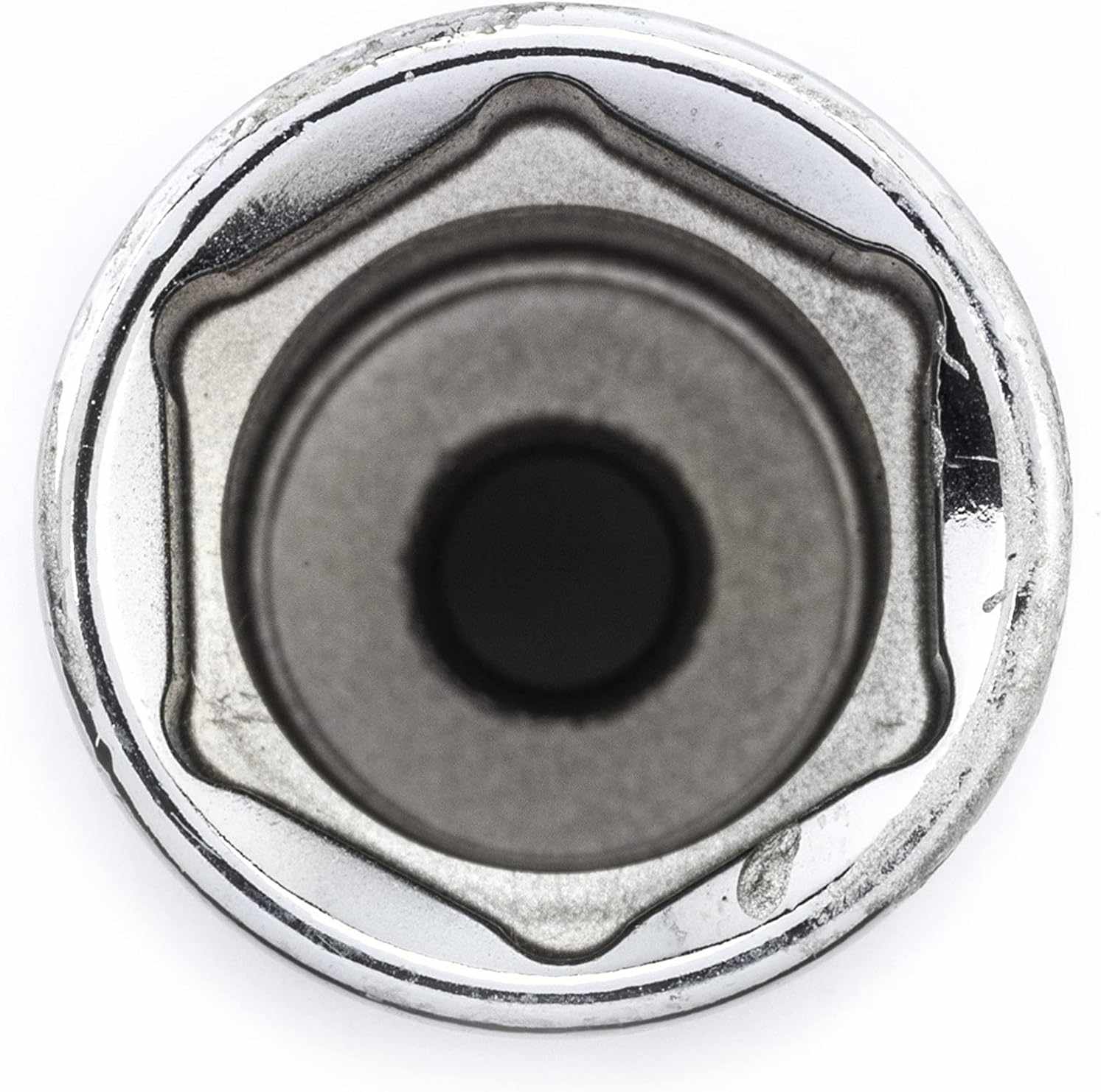 Top-down view into the 6-point opening of a GearWrench socket, showcasing the off-corner loading geometry designed to provide maximum torque and superior grip while protecting fasteners from rounding.