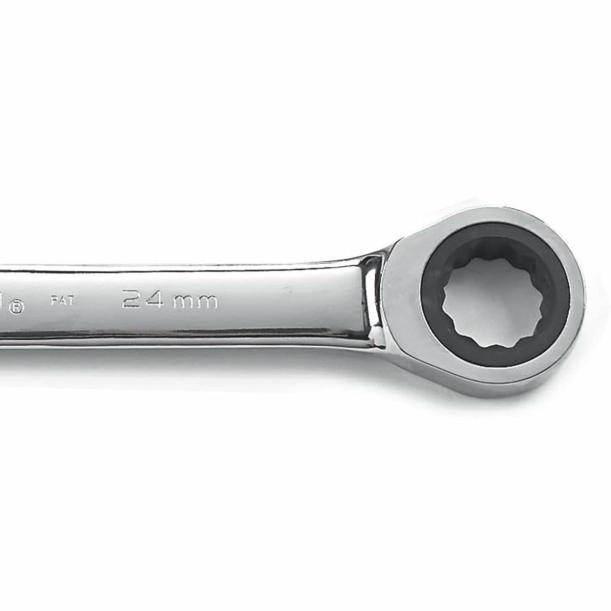Close-up of a 24 mm ratcheting box-end wrench with polished chrome finish. The ratcheting mechanism is visible inside the circular end, designed for gripping and turning bolts in confined mechanical or automotive spaces