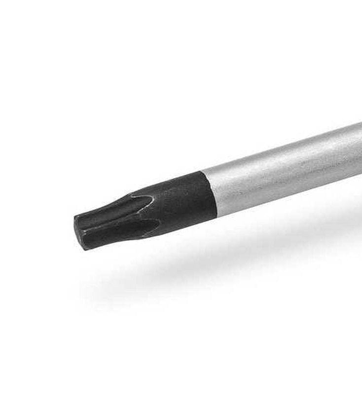 A macro shot of a GEARWRENCH Torx screwdriver tip emphasizing the high-strength alloy steel construction and precise fit for secure fastening in high-performance environments.