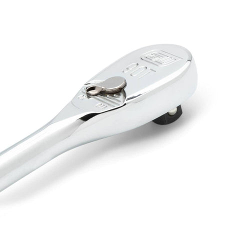 A close-up view of the GEARWRENCH 90-tooth ratchet head emphasizing the low profile design and the flush-mounted on-off reversing lever for improved accessibility in tight automotive engine bays.
