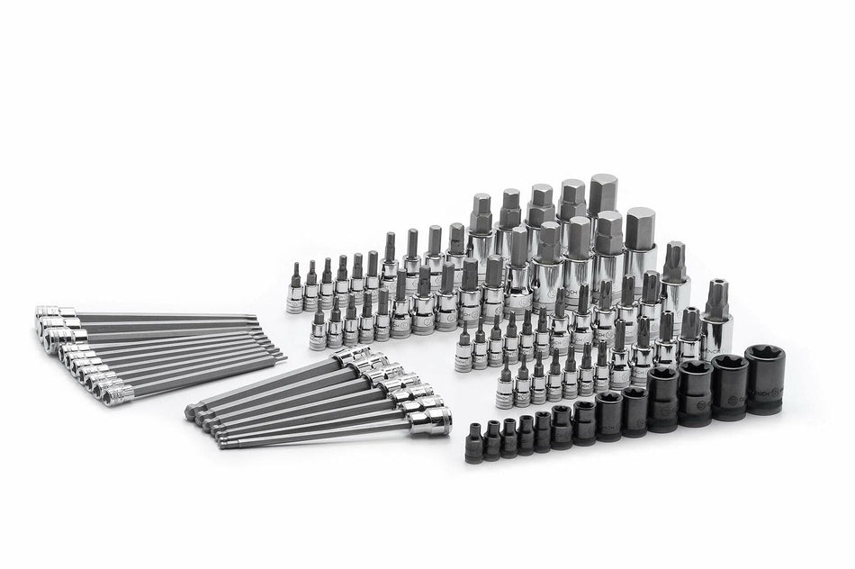 The complete 84-piece GEARWRENCH master set laid out, showcasing the large assortment of Hex, Torx, and External Torx bit sockets in chrome and black oxide finishes.