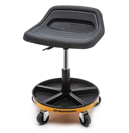 A front-facing studio shot of the GEARWRENCH 86994 adjustable rolling mechanics seat featuring a black solvent-resistant rubber seat, an air shock telescoping pillar, and a circular base with five integrated black parts trays on four swivel casters.