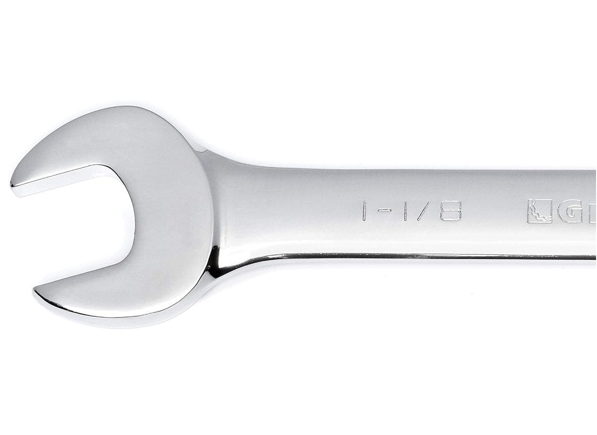 A close-up shot of the open end of a GearWrench combination wrench showing the 1-1/8 inch size marking and the high-strength alloy steel construction.
