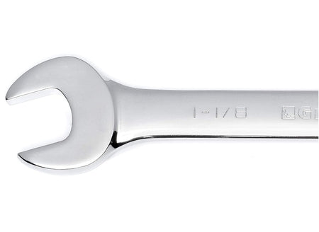 A close-up shot of the open end of a GearWrench combination wrench showing the 1-1/8 inch size marking and the high-strength alloy steel construction.