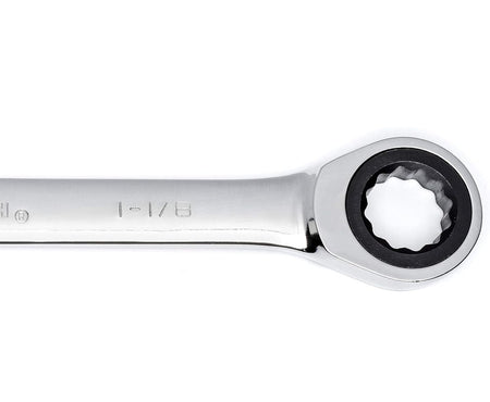 A detailed view of the 12-point ratcheting box end of a GearWrench combination wrench with a 1-1/8 inch size stamp and a full polish chrome finish.