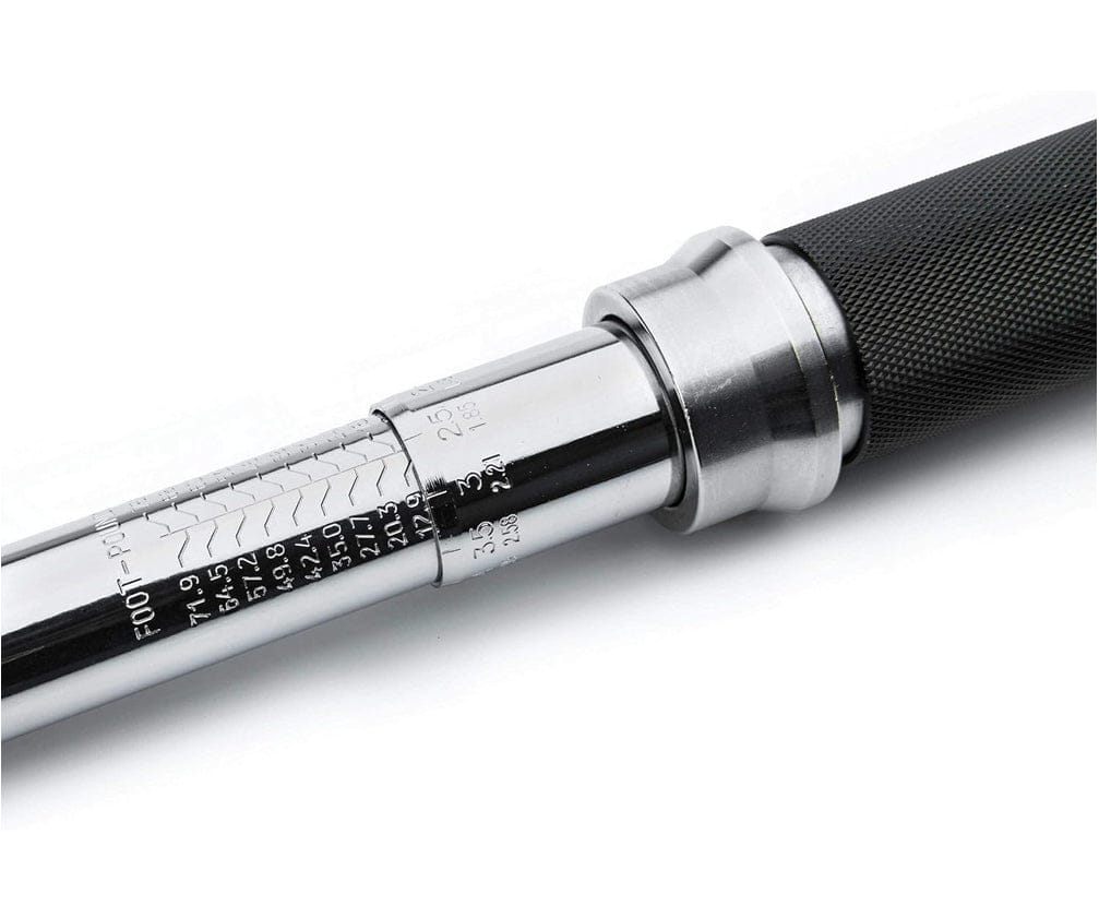 A detailed close-up of the torque wrench scale, clearly showing the "Nm" and "ft.lb" indicators next to the measurement windows.