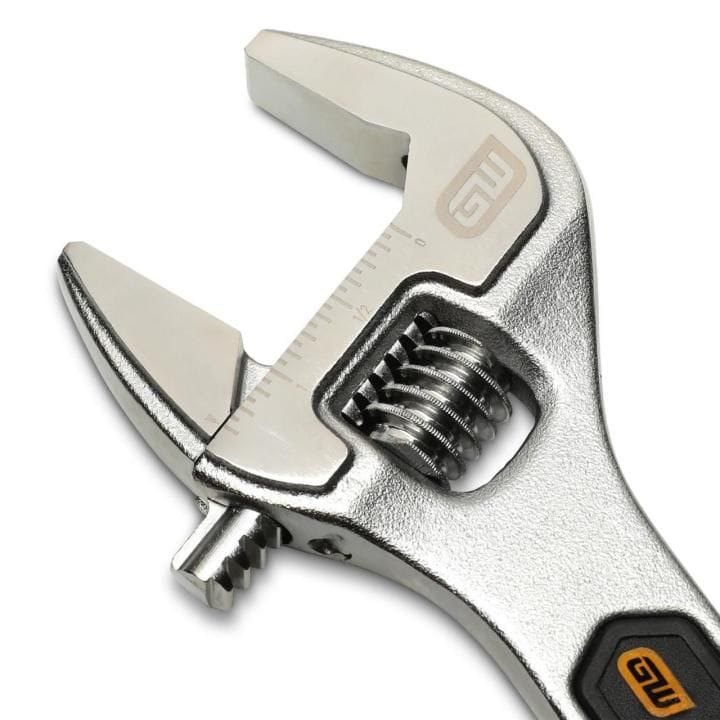 A macro close-up of a GEARWRENCH adjustable wrench head displaying the laser-etched jaw scale measurements and the tightly aligned high-tolerance knurled thread adjustment screw.