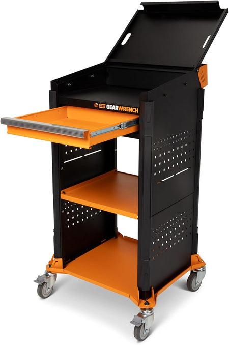 A three-quarter view of the rolling utility tool station displaying the upper lockable top compartment cover fully propped open and the molten orange mechanical tool storage drawer pulled forward on its heavy ball-bearing track slides.