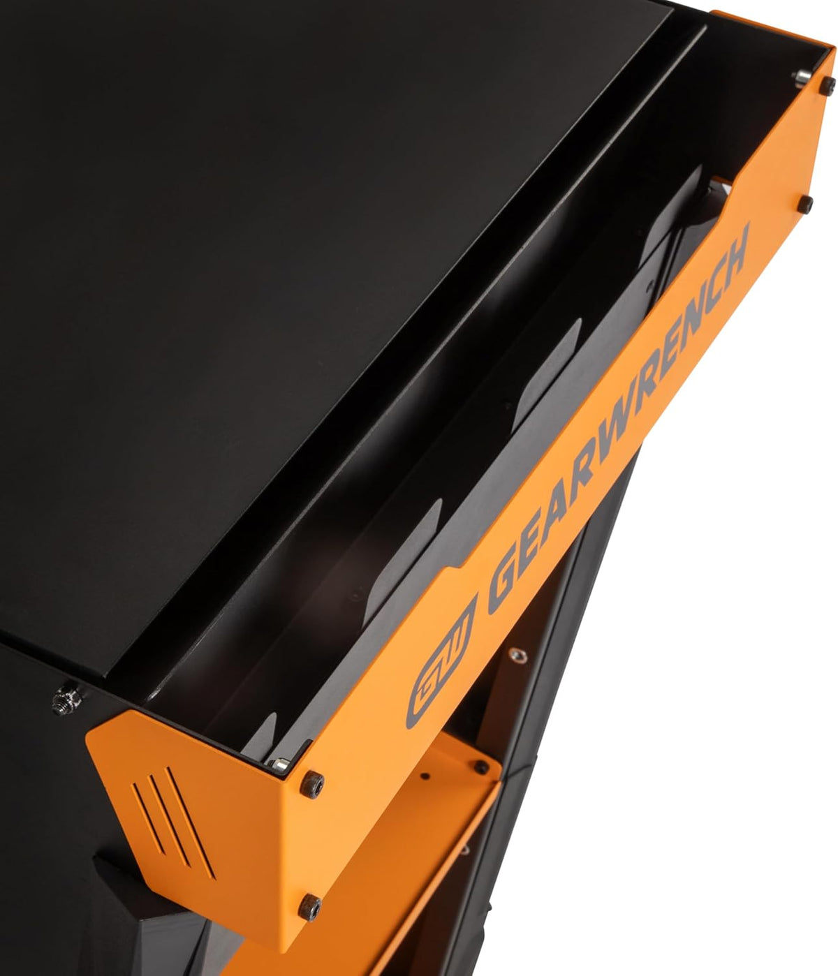An overhead detail close-up view of the rear storage section of the mobile tool cabinet showcasing the hidden steel wire document rack and integrated laptop or document shelf layout bounded by protective side guards.