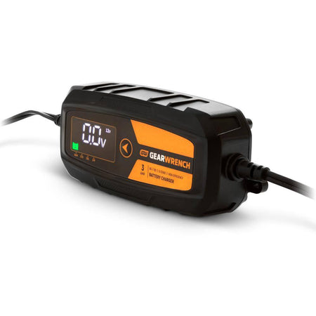 A perspective view of the GEARWRENCH 3 Amp smart battery charger. The shot emphasizes the ruggedized plastic housing and the professional-grade strain relief on the high-reach power cables, illustrating the tool's durability for heavy-duty shop environments.