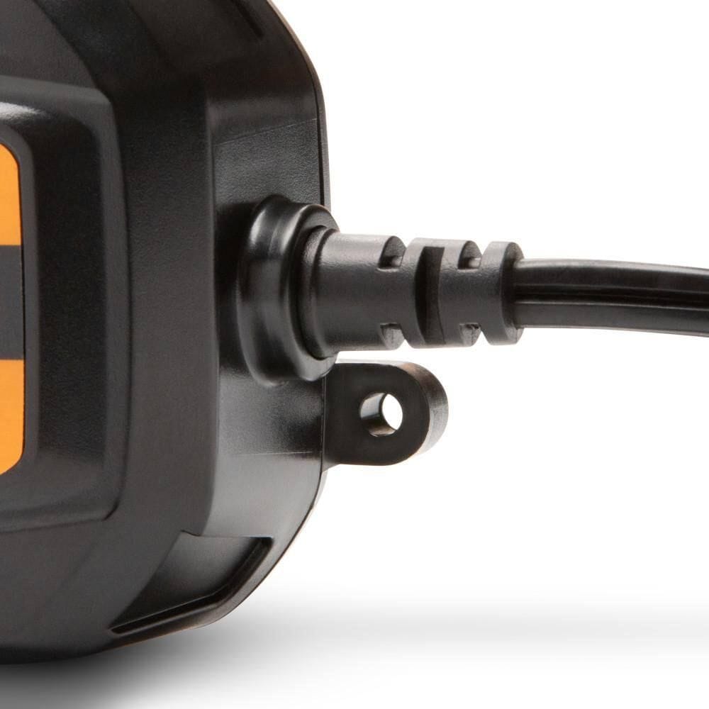 A close-up detail shot of the integrated mounting eyelet and heavy-duty cable entry point on the GEARWRENCH GWBC030 unit. This image highlights physical design features that allow for secure wall mounting and reliable protection for the 13-foot charging cords.