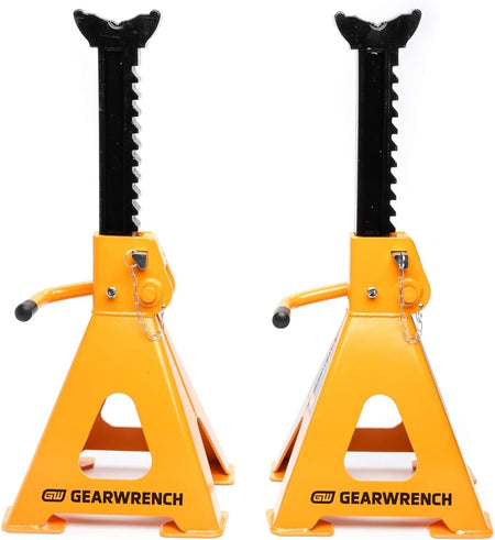 Front view of two fully extended GEARWRENCH 12-ton ratcheting jack stands in molten orange, showcasing the heavy-duty ductile iron bars and secure double-locking pin safety mechanisms.