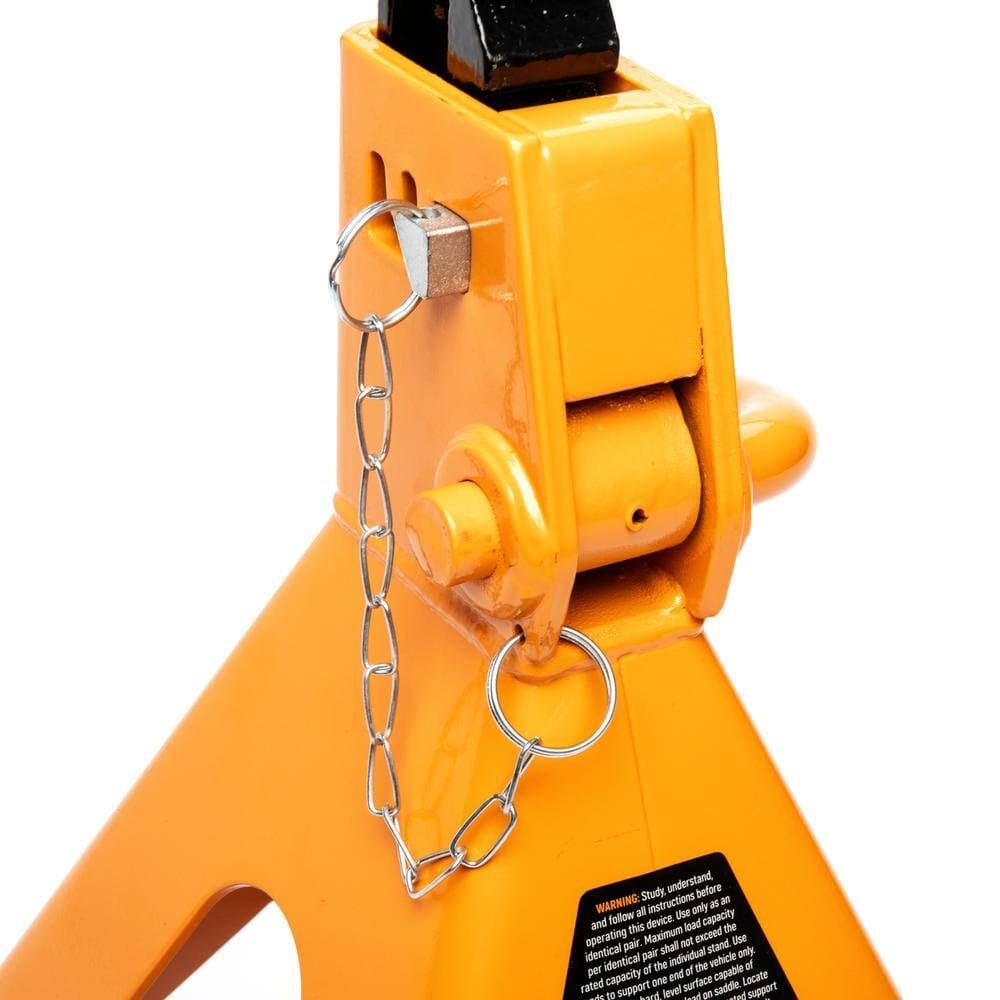 Detailed view of the double lock pin safety mechanism on a GEARWRENCH jack stand, showing the pin and security chain designed to provide an added layer of protection.