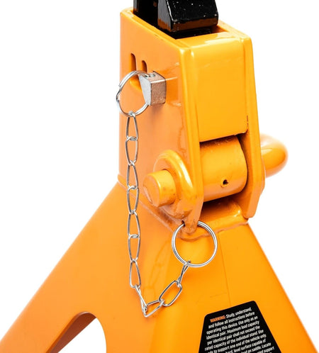 Detailed close-up of the safety locking pin and chain assembly on the GEARWRENCH jack stand, highlighting the forged steel construction and safety warning labels.