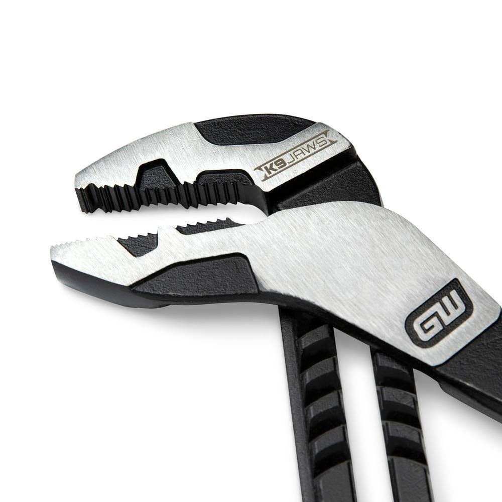 A close-up action shot of the GEARWRENCH K9 jaw design on a pair of PITBULL pliers, demonstrating the aggressive cross-hatched and angled teeth designed to provide a secure grip at severe 35-degree angles.