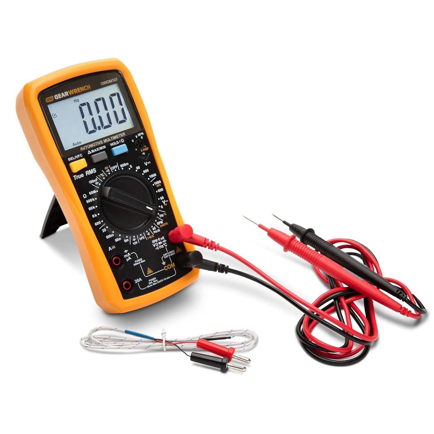 Angled view of the GEARWRENCH 1000V AC/DC tester GWDM107 standing upright using its built-in kickstand, positioned next to the included red and black test leads and thermocouple.