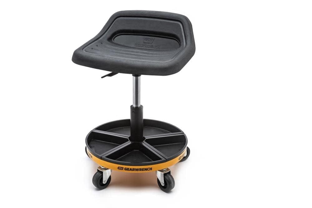 GearWrench rolling mechanic’s stool with contoured seat, adjustable height shaft, and tool tray base mounted on caster wheels for workshop mobility.