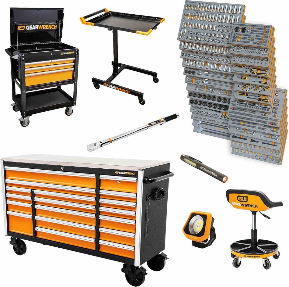 Wide-angle view of the complete GearWrench MEGAMOD1268 tool set including two rolling cabinets, modular foam trays, mechanic’s stool, mobile work table, torque wrench, inspection lights, and assorted hand tools arranged in a professional workshop layout.